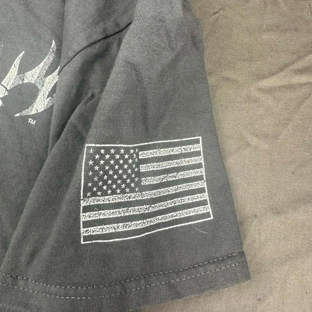 Buck Wear Mens These Colors Dont Run Reload T-Shirt Small Gray American Flag Tee